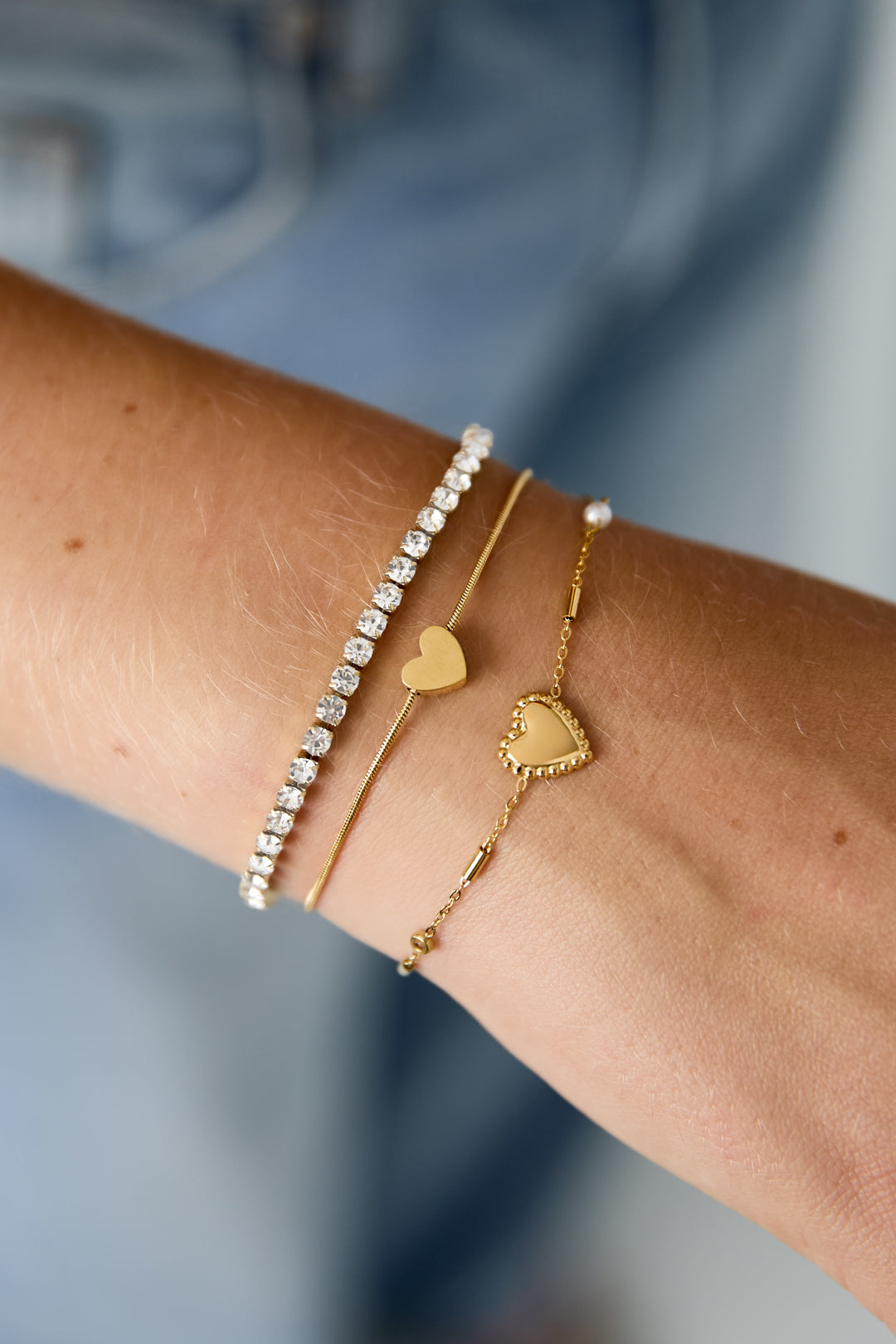 Dubbele armband met minimalistisch hartje en zirkonia steentjes